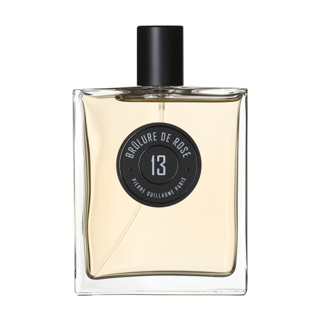 Perfume bottle with a black cap and label on a white background