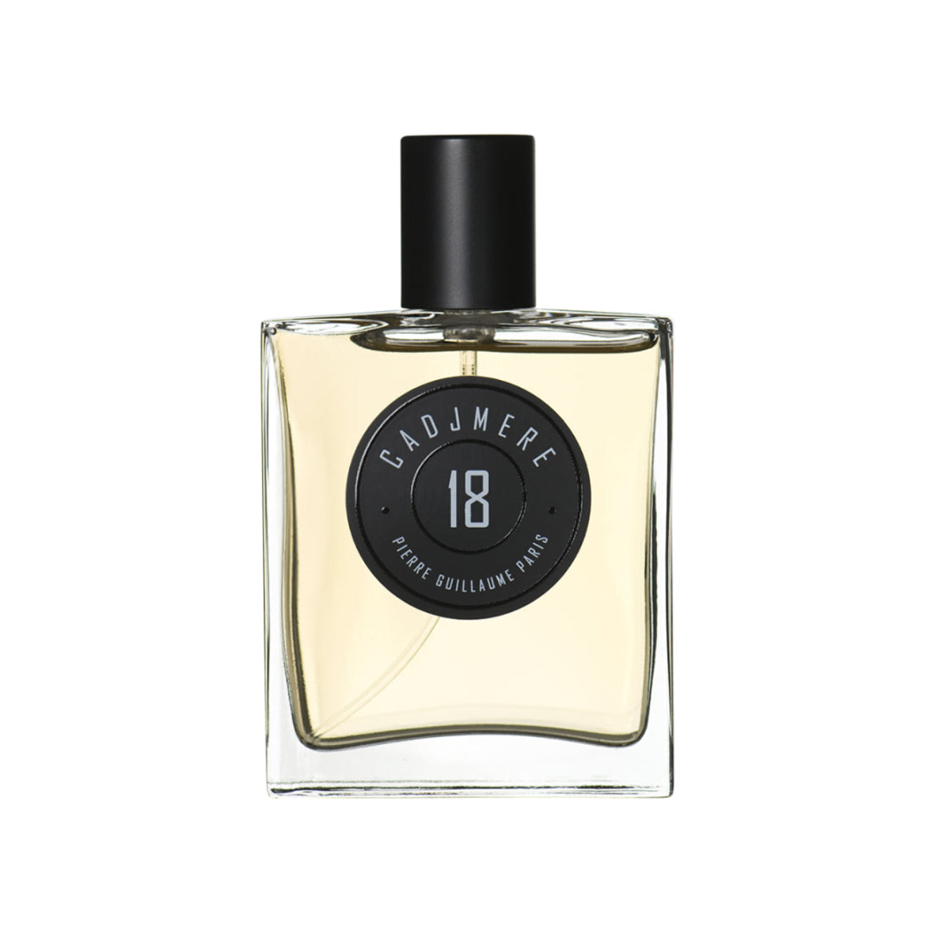 Perfume bottle with black cap and 'Cadmere' label on a white background
