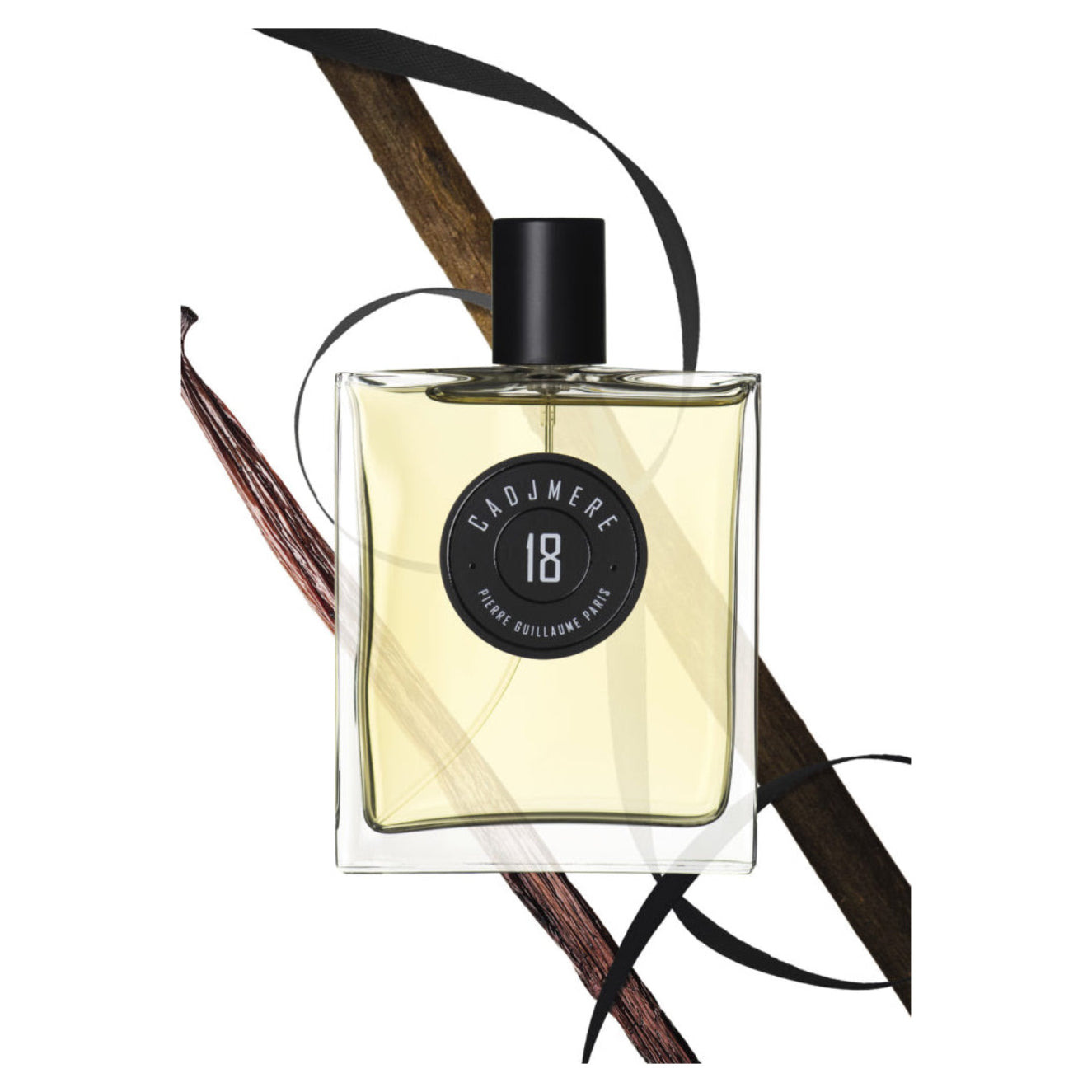 Perfume bottle with a black cap and gold label on a white background