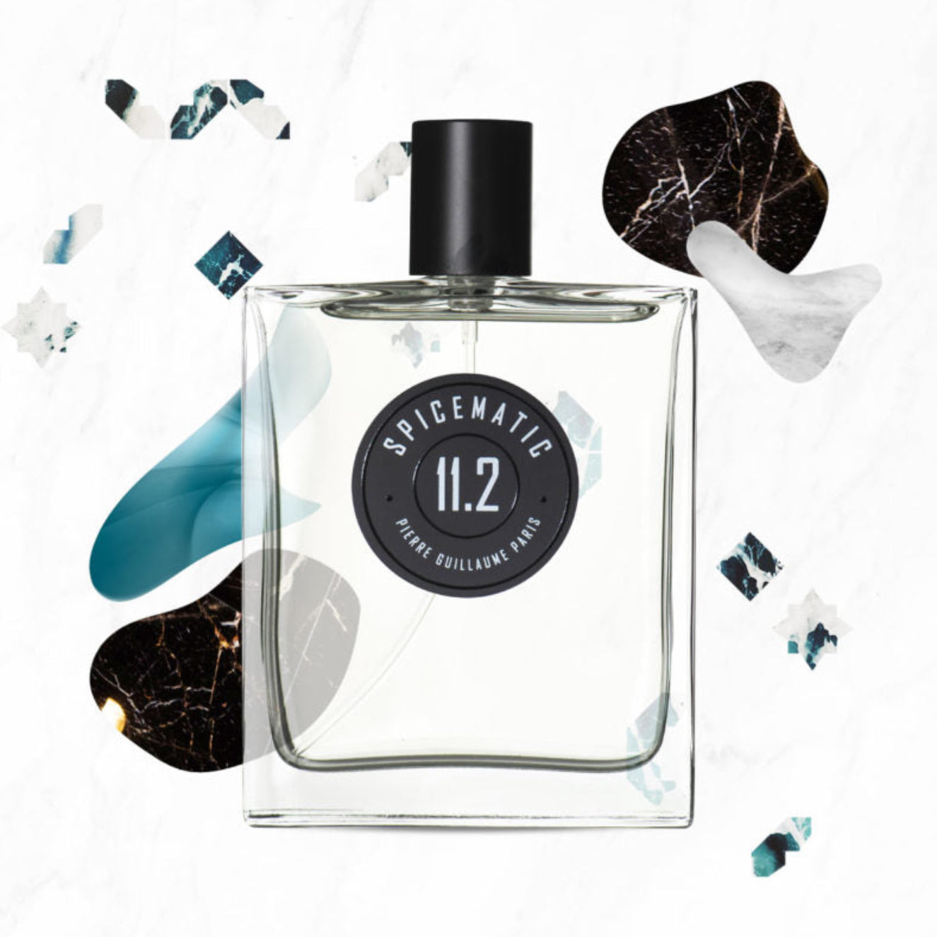 Clear perfume bottle with black cap and label on a white background